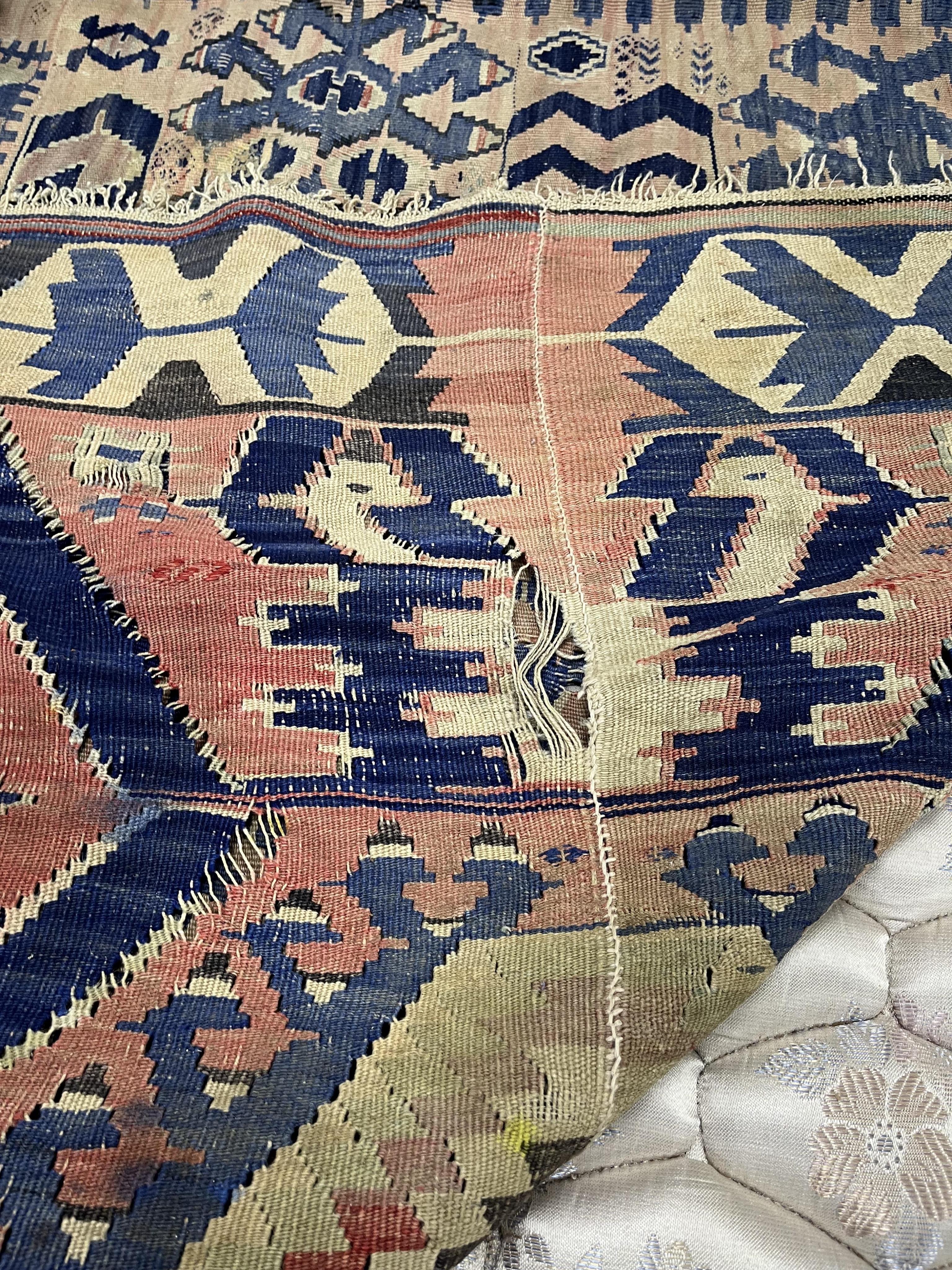 A Kilim polychrome flatweave carpet, 298 x 199cm